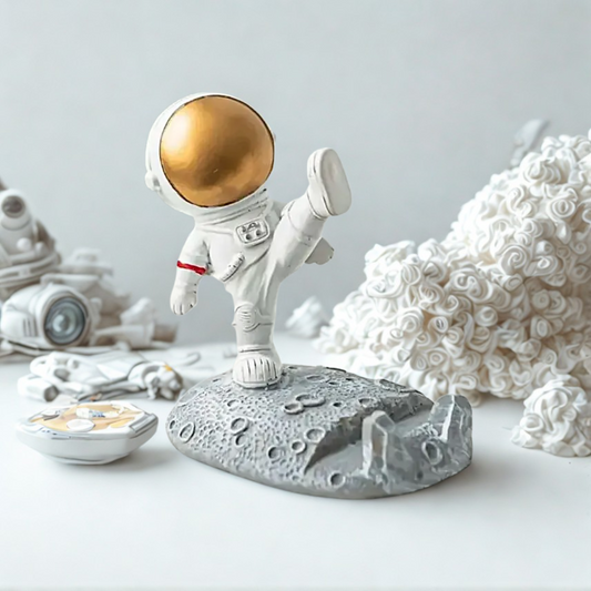 Kicking Astronaut Mobile Phone Holder